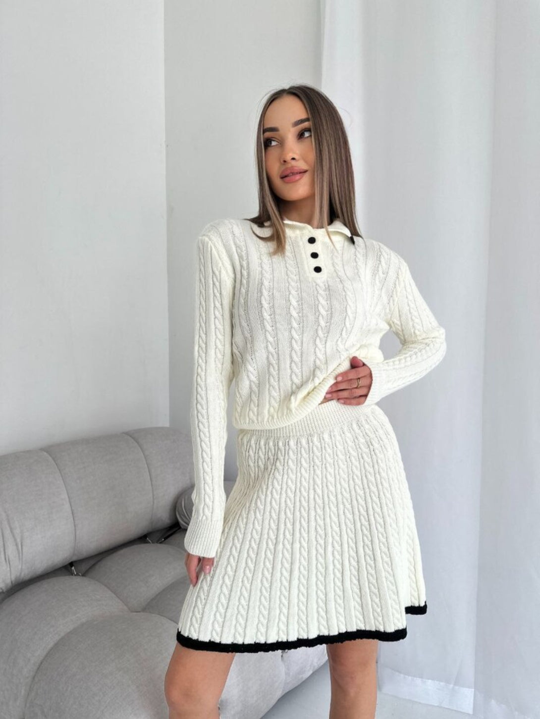 White long sleeved short skirt sweater set